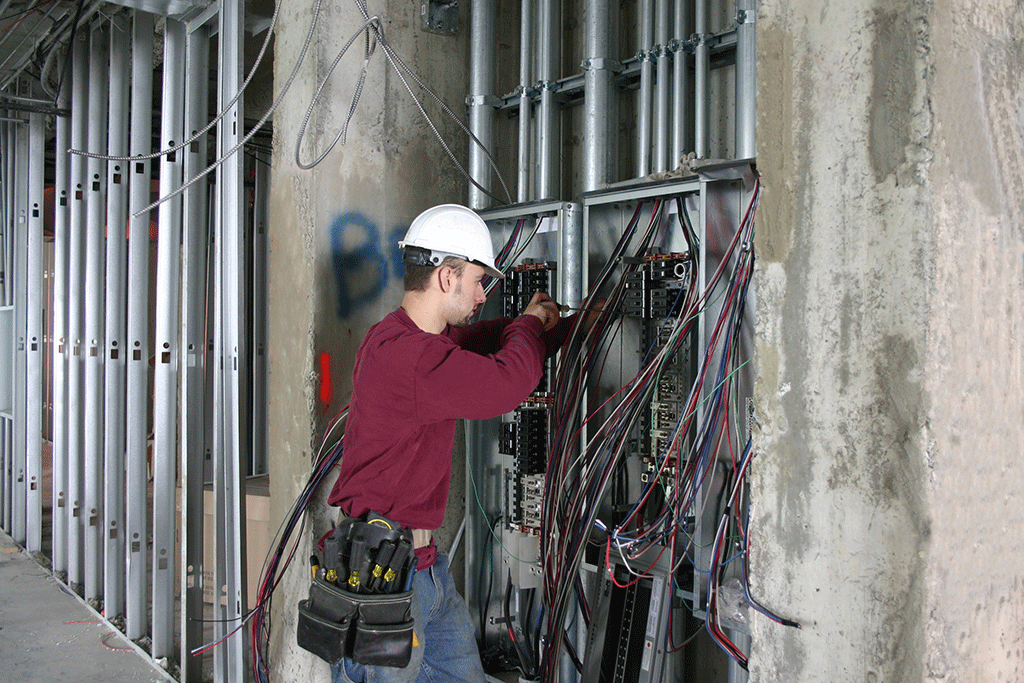Electrician-working-in-an-Electrical-Panel
